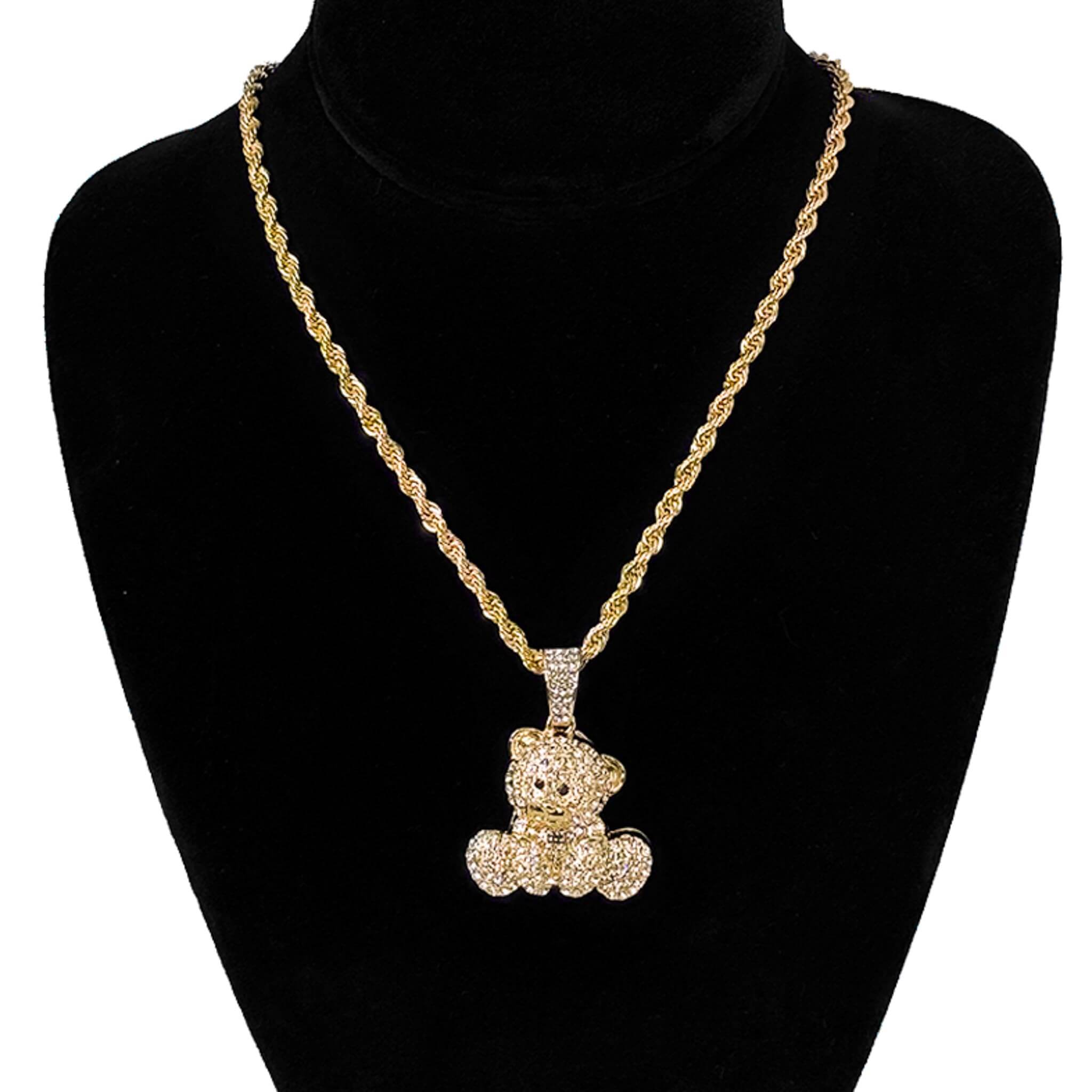 Ladies 32mm iced-out gold bear pendant necklace with 4mm rope chain displayed on jewelry stand