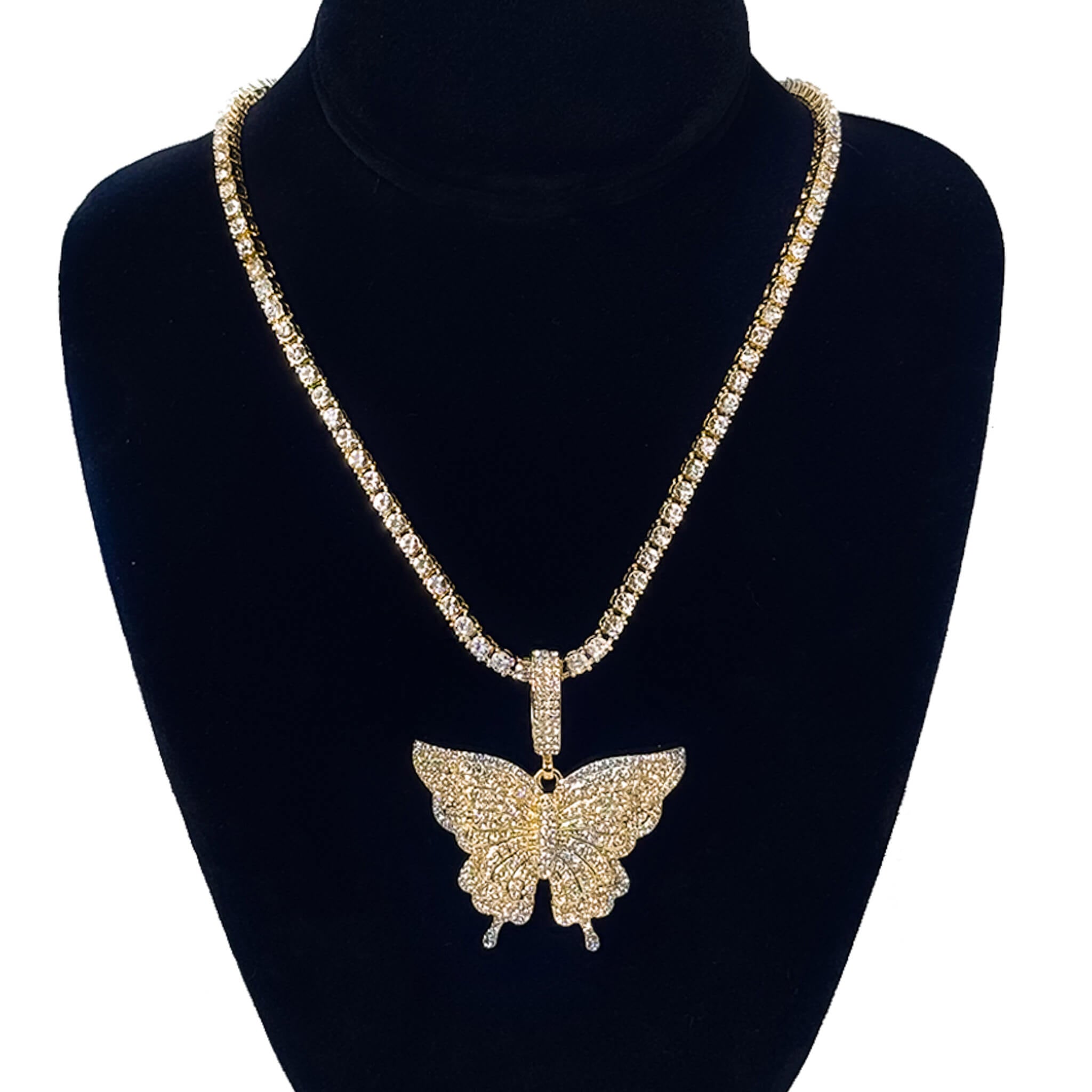 Ladies 50mm large iced-out gold butterfly pendant necklace with 4mm tennis chain on display.