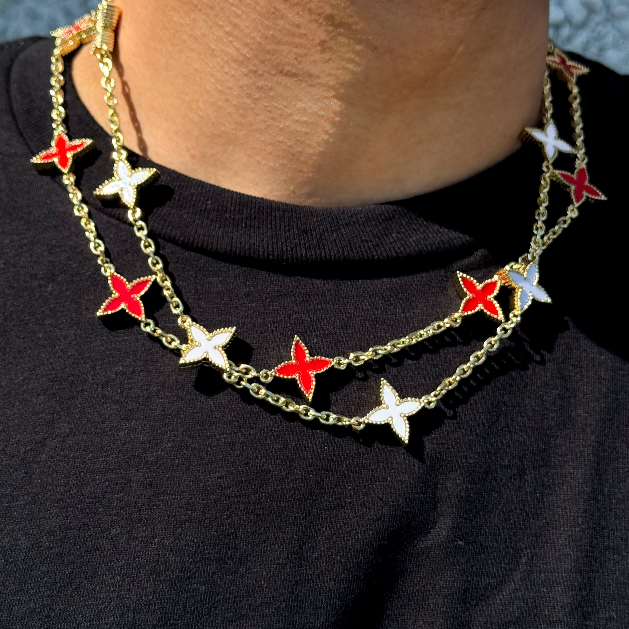 Men's 18mm Louis inspired White Multi Charm Necklace in gold with red and white star charms shown on model.