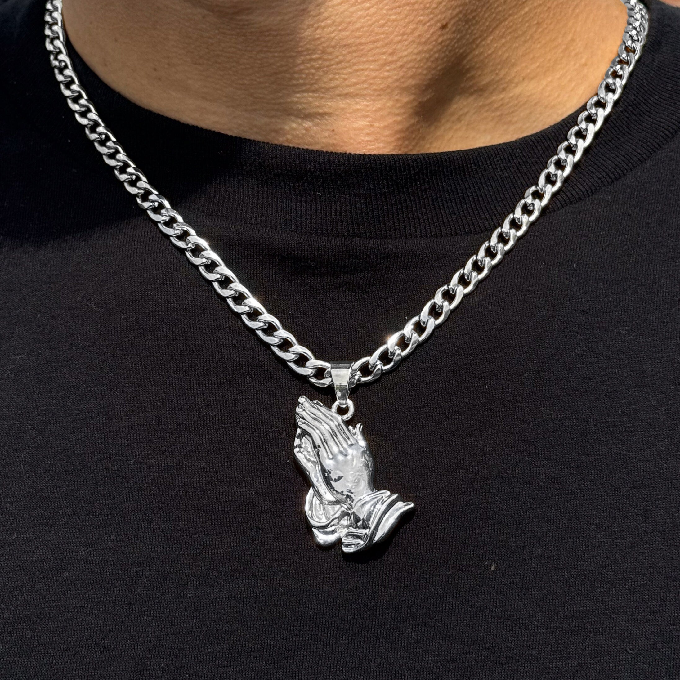 Men’s medium silver praying hands pendant on a 5mm Cuban chain with polished religious design