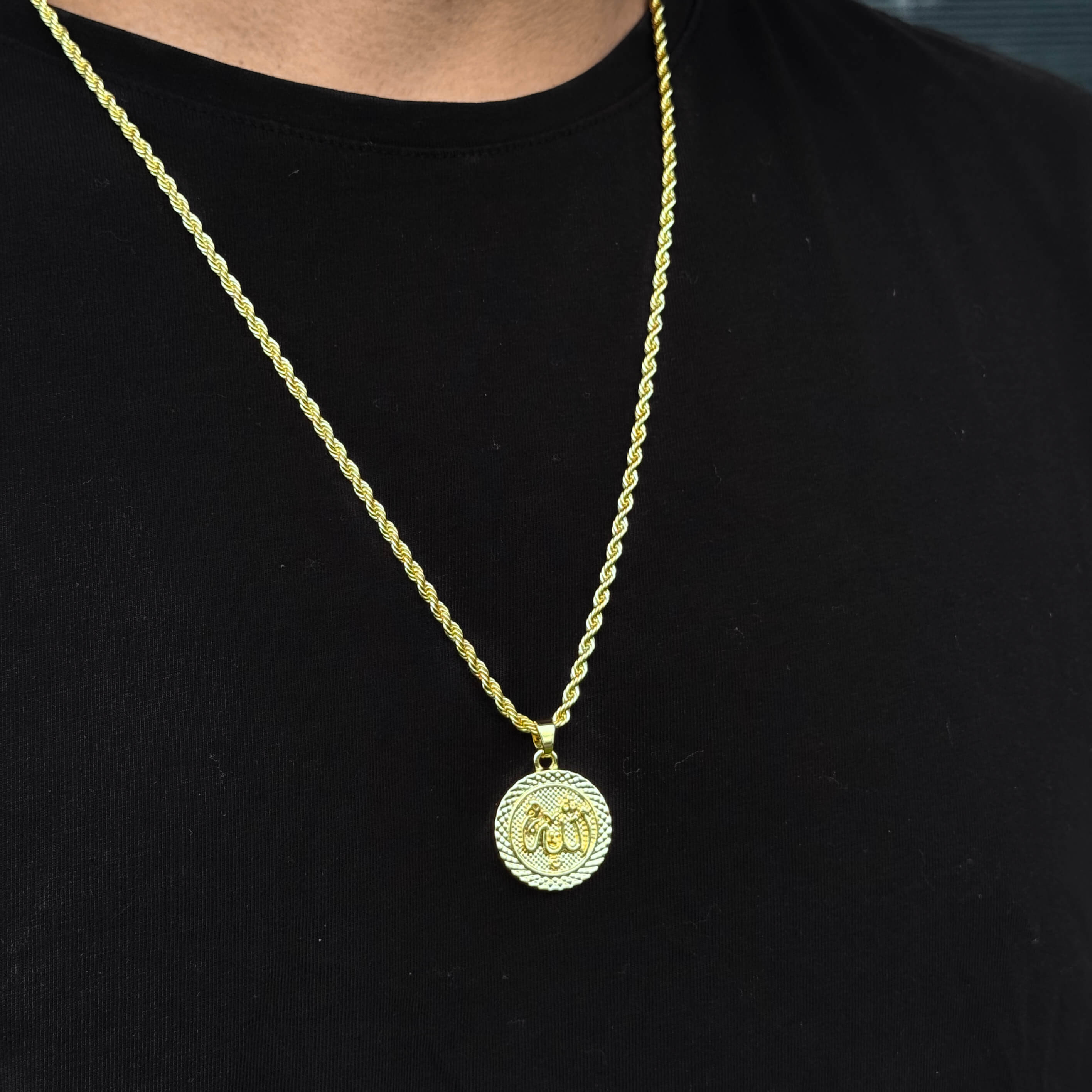 Gold Men's 30mm Iced-Out Allah Medallion Pendant on 5mm rope chain worn on black shirt.