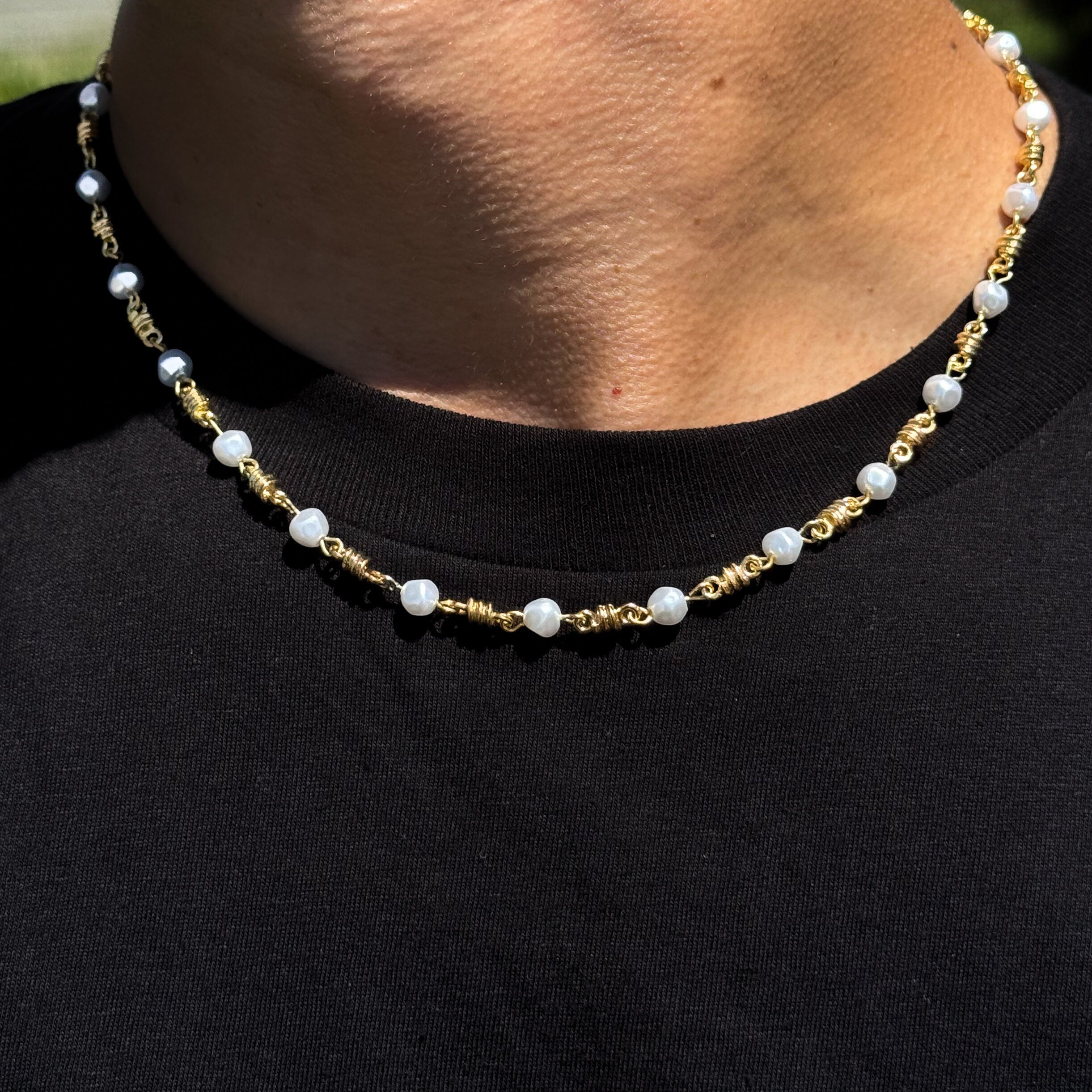 Men’s 6mm pearl barbed wire necklace in gold, shown worn to display the 20-inch fit and design.