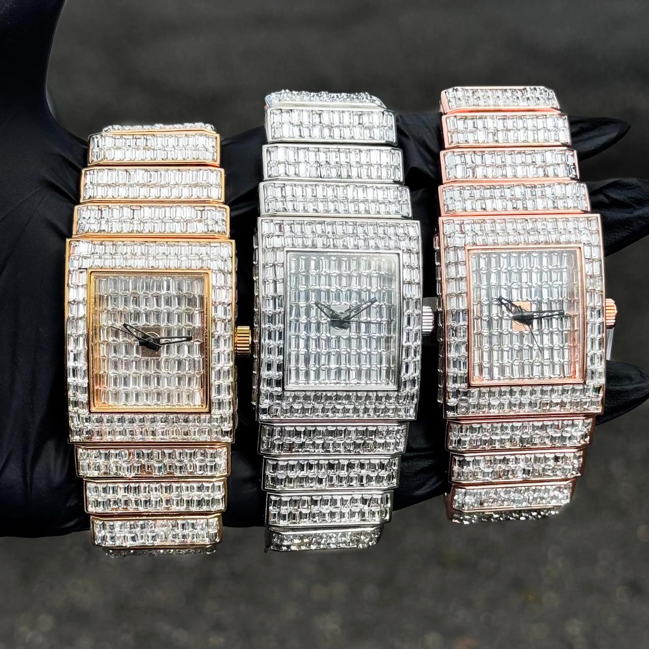 Women's 30mm fully iced-out diamond watches in gold, silver and rose gold with baguette dial.