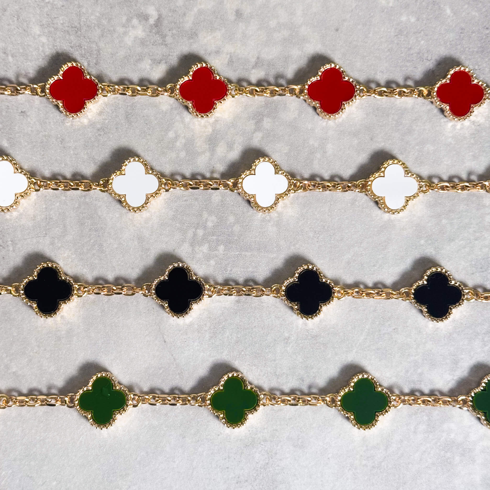 Clover with Cuban Link Bracelet 3-Piece Set in white enamel with gold and crystal links.