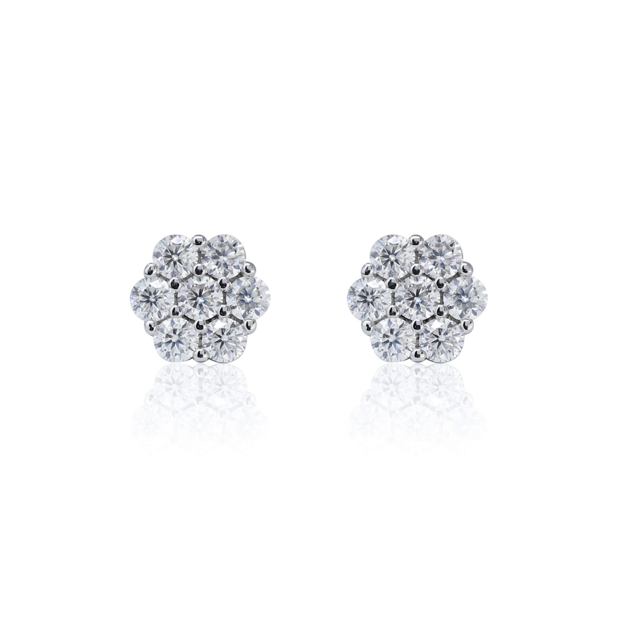 6mm Moissanite cluster earrings with 0.53ct diamond studs in polished sterling silver, front view.