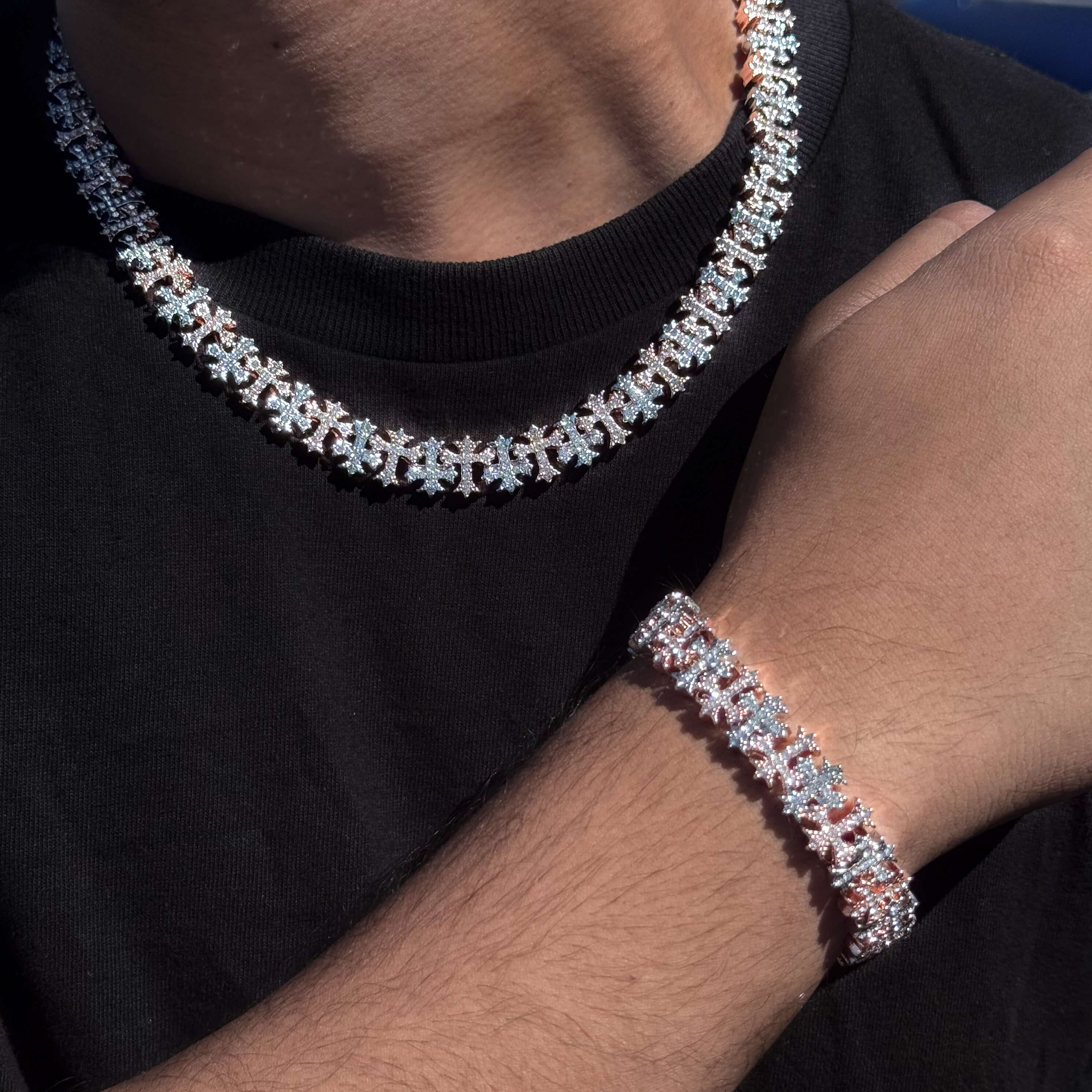 Rose gold and silver 2-piece iced Cross necklace and bracelet set with sparkling Clear stones and clover links.