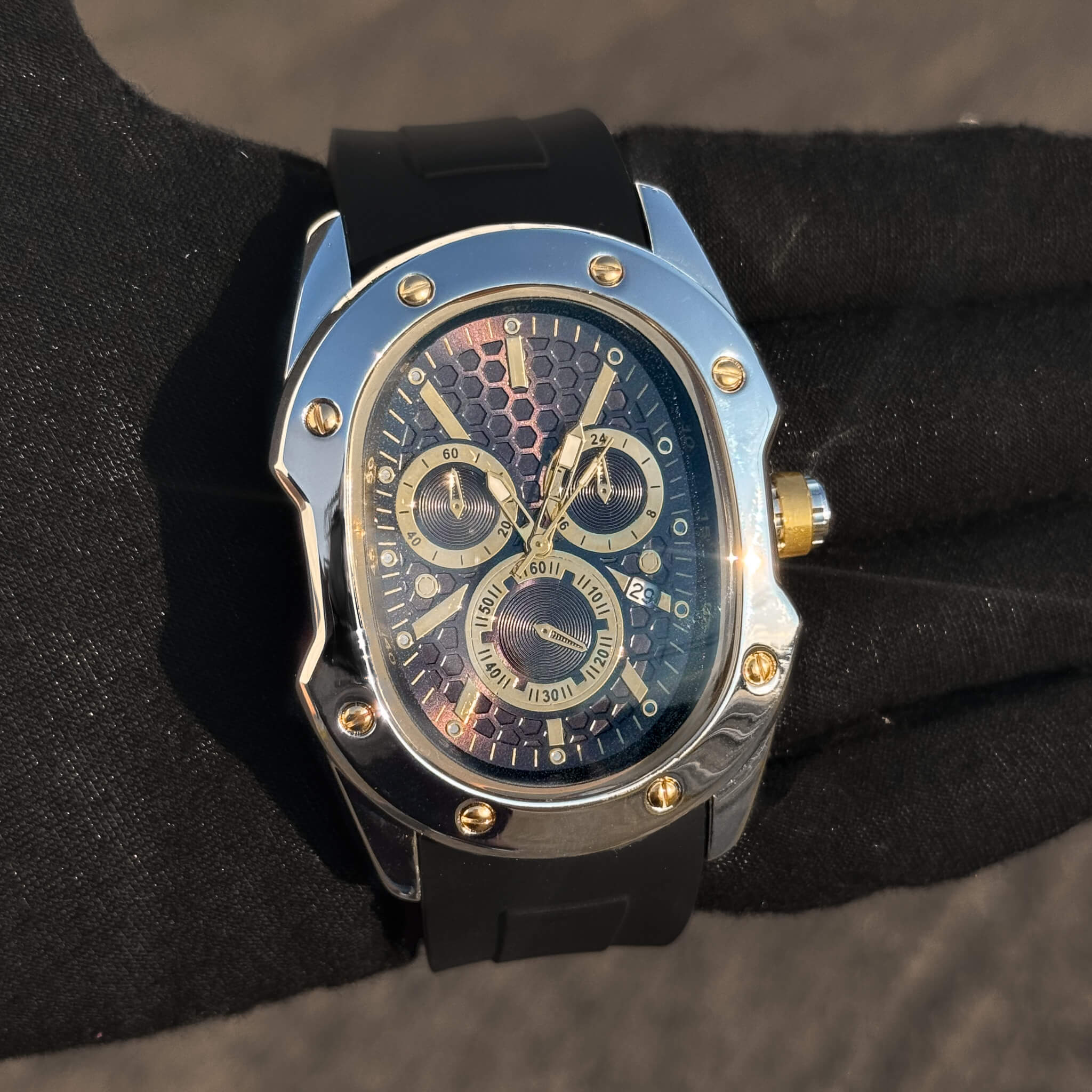 Silver Men’s 40mm Classic Watch with black honeycomb dial and gold-tone accents.