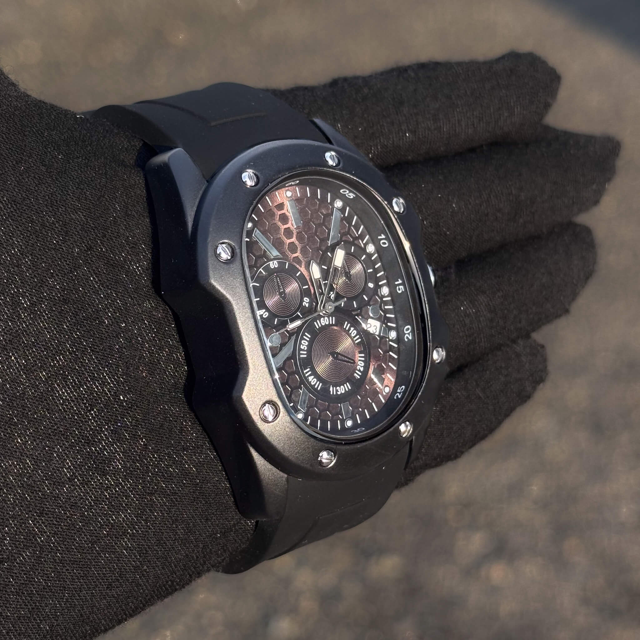 Angled Men’s 40mm Classic Black Watch showing black dial and rugged black case.