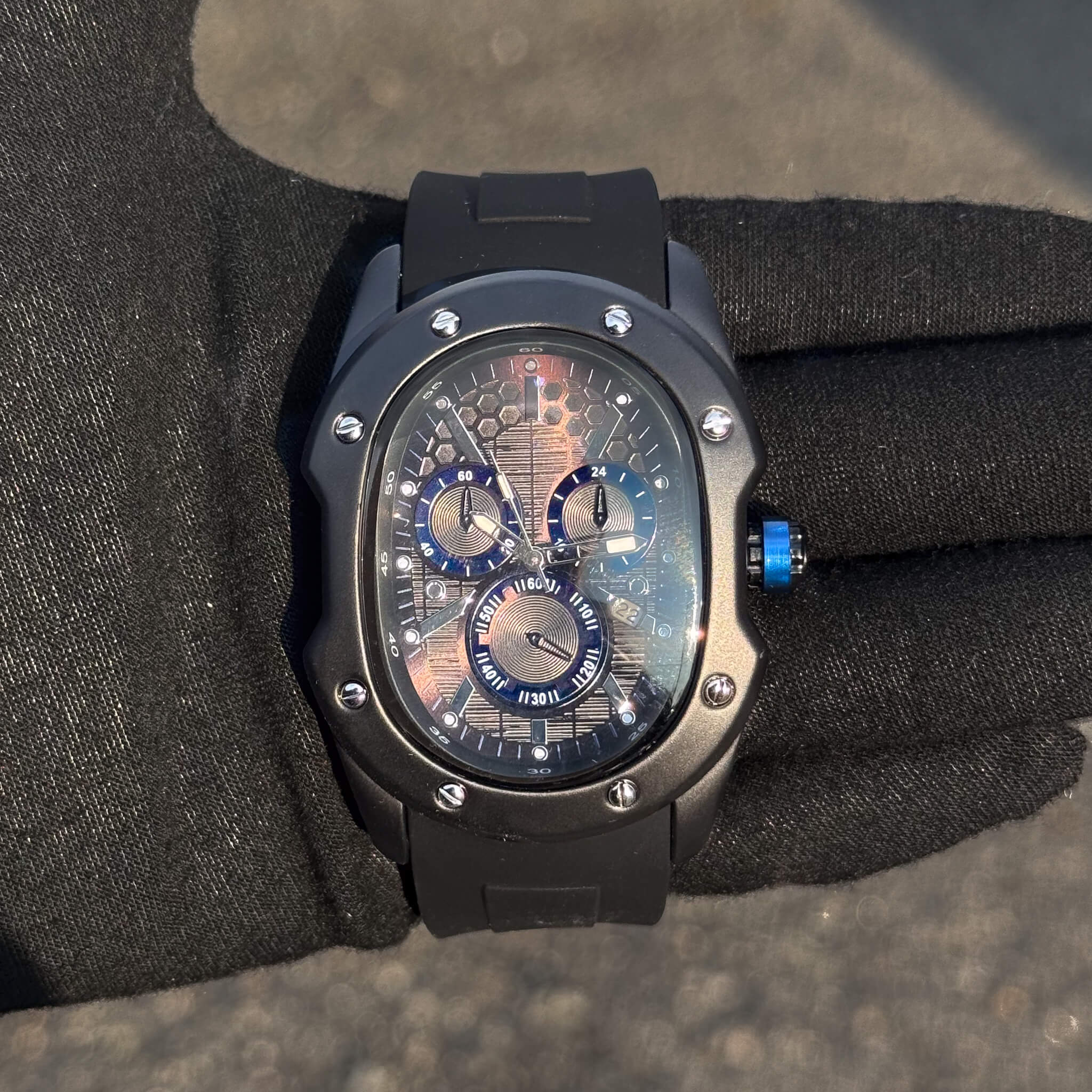 Men’s 40mm Classic Black Watch with blue-accented honeycomb dial and matte black case.