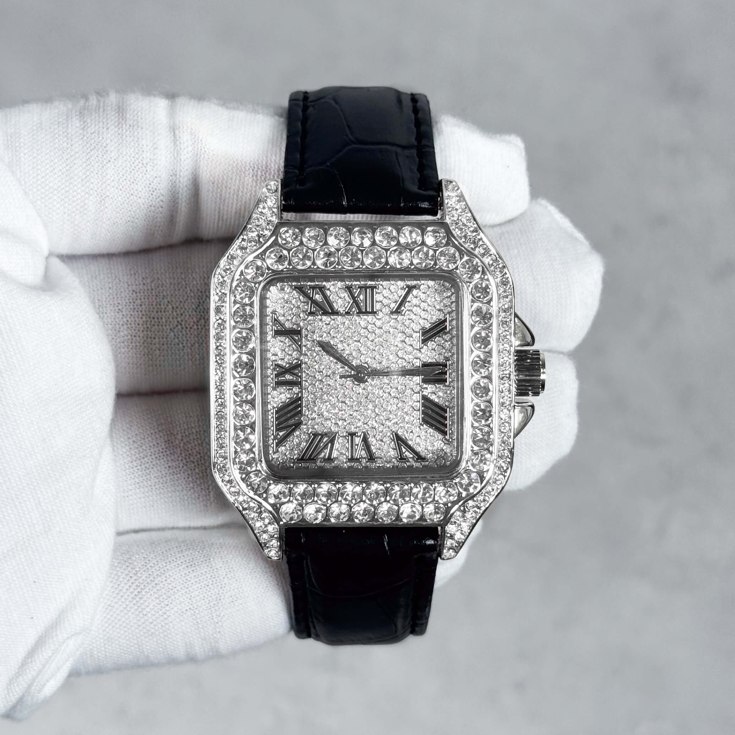 Men's 32mm silver iced out square dial watch with full crystal bezel and black leather band.