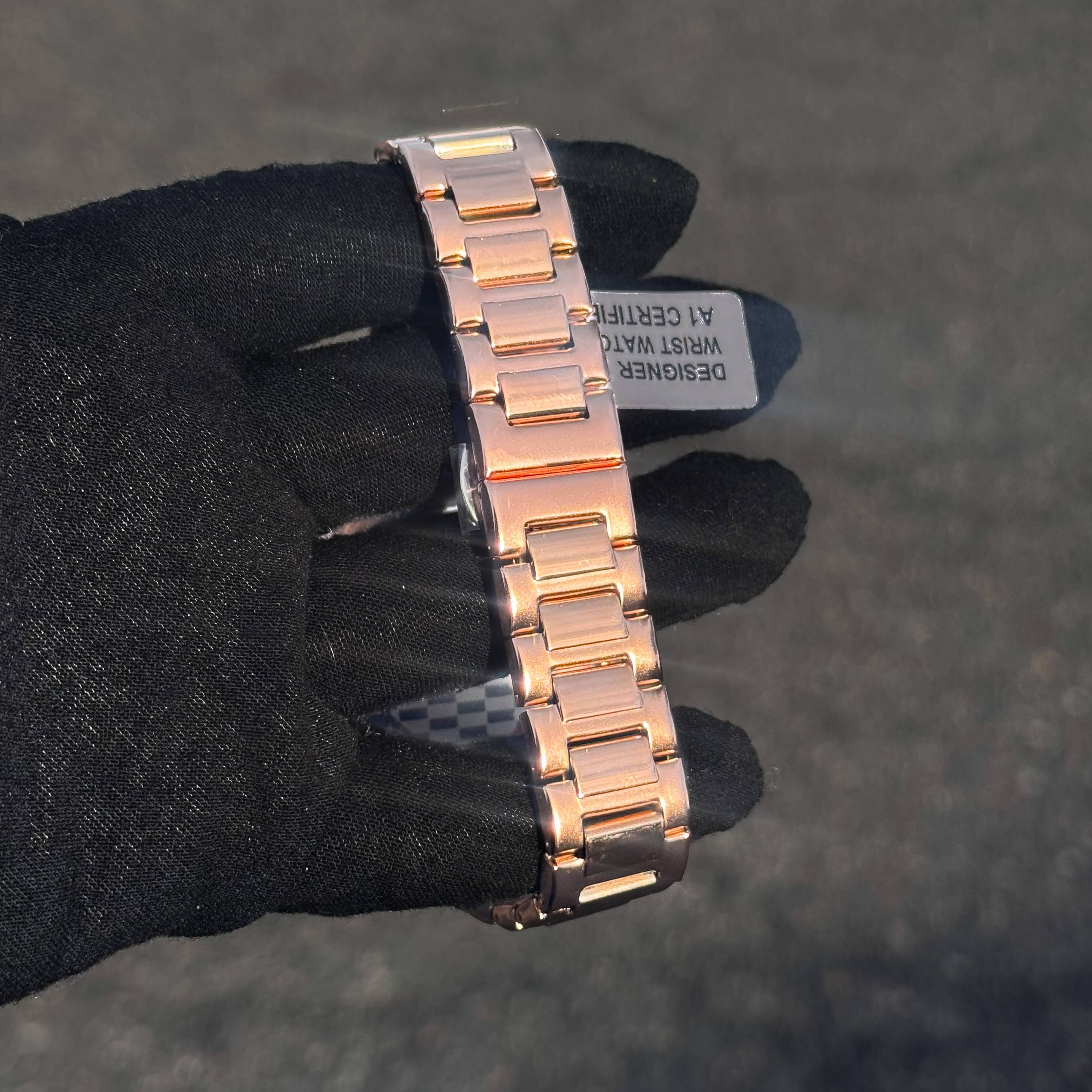 Men’s 42mm Classic Oblong Dial Watch featuring rose gold finish stainless steel bracelet rear view.