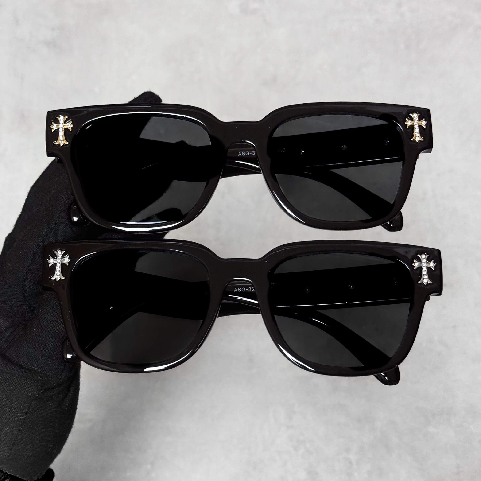 Black Triple Cross Chrome Inspired Sunglasses with glossy frame and gold or silver cross details.