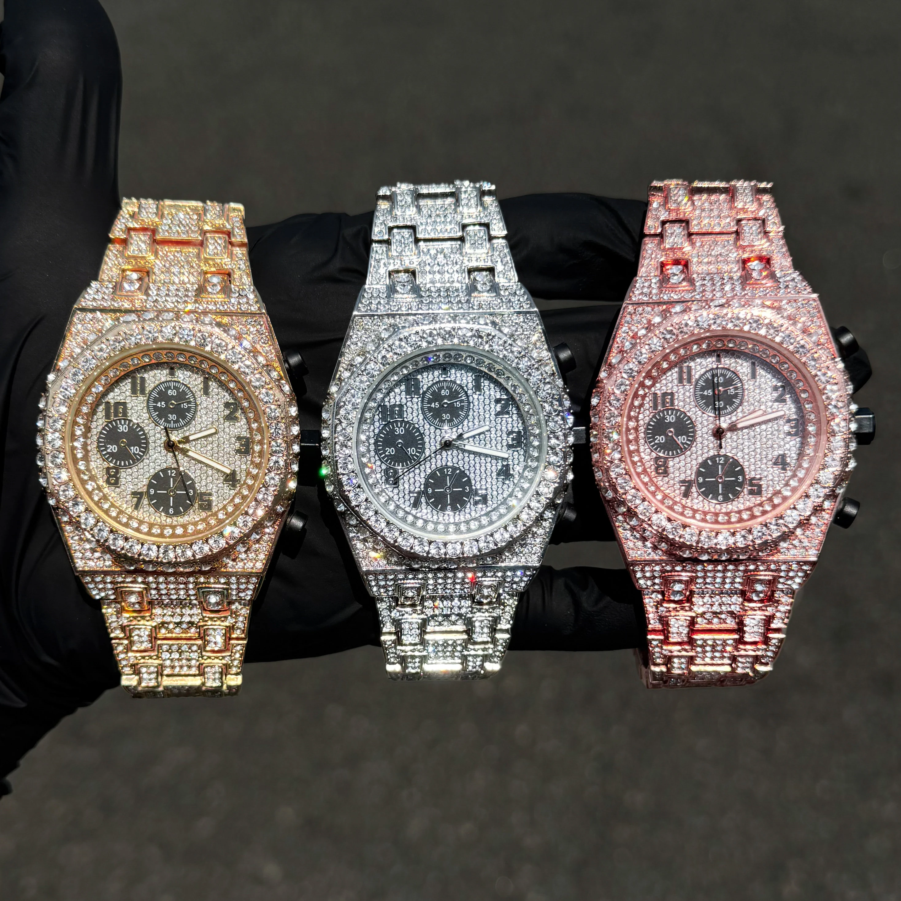 Men's 42mm fully iced out diamond watch trio with octagon cases and crystal link bands.