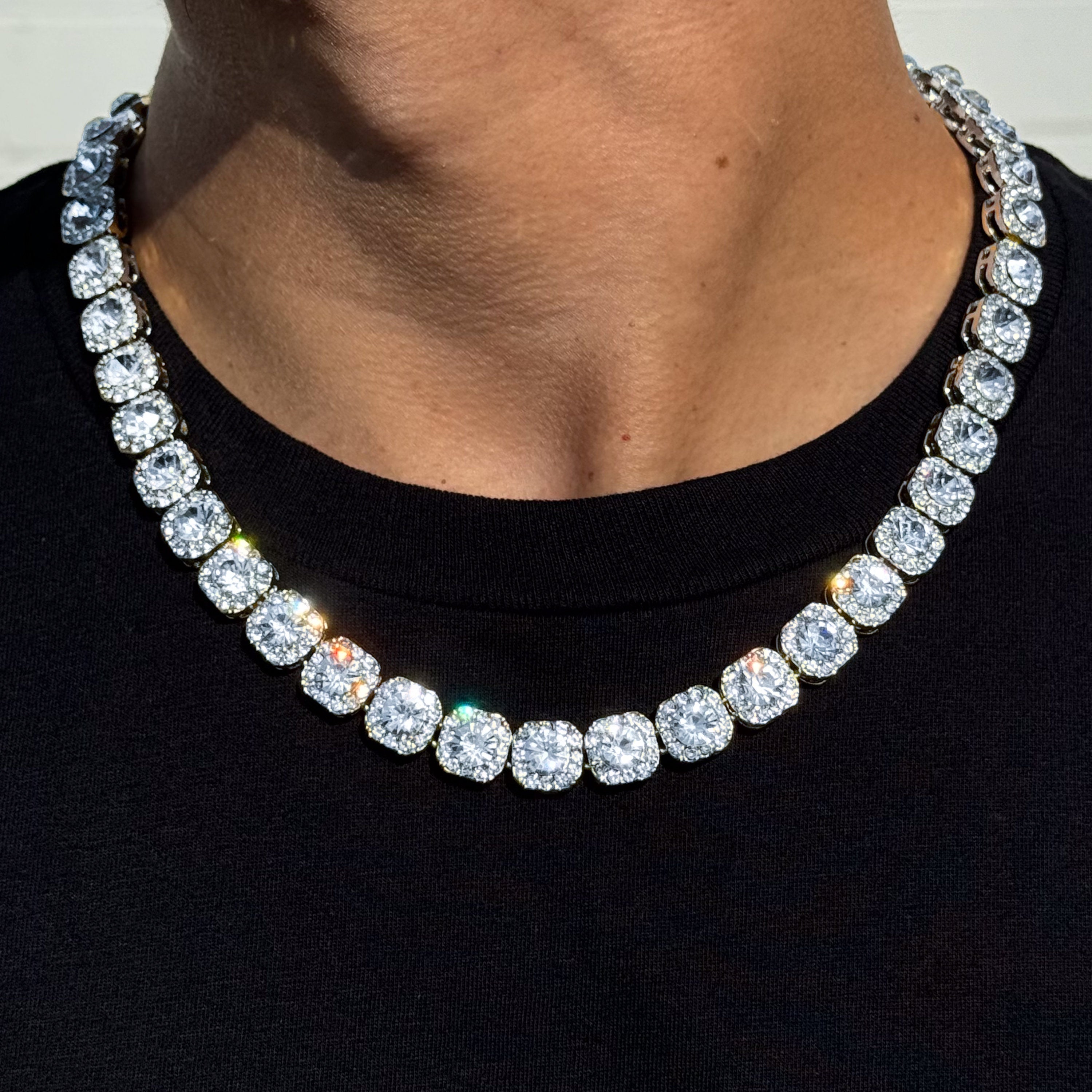 Square Cluster Tennis Chain with gold setting and large round-cut diamond stones, close-up worn necklace view.