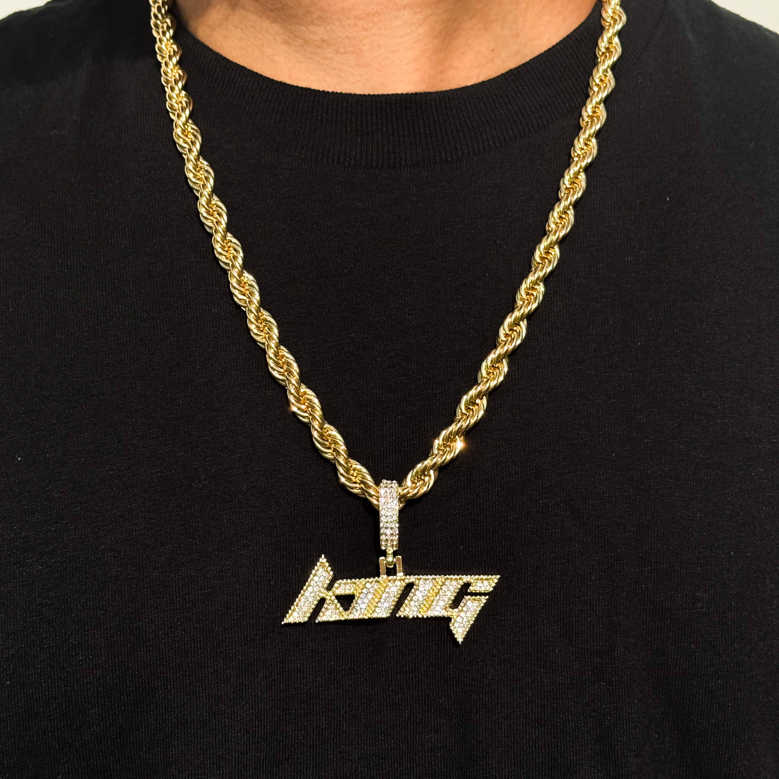 Gold “King” pendant with iced out lettering on an 8mm rope chain, men's hip hop necklace.