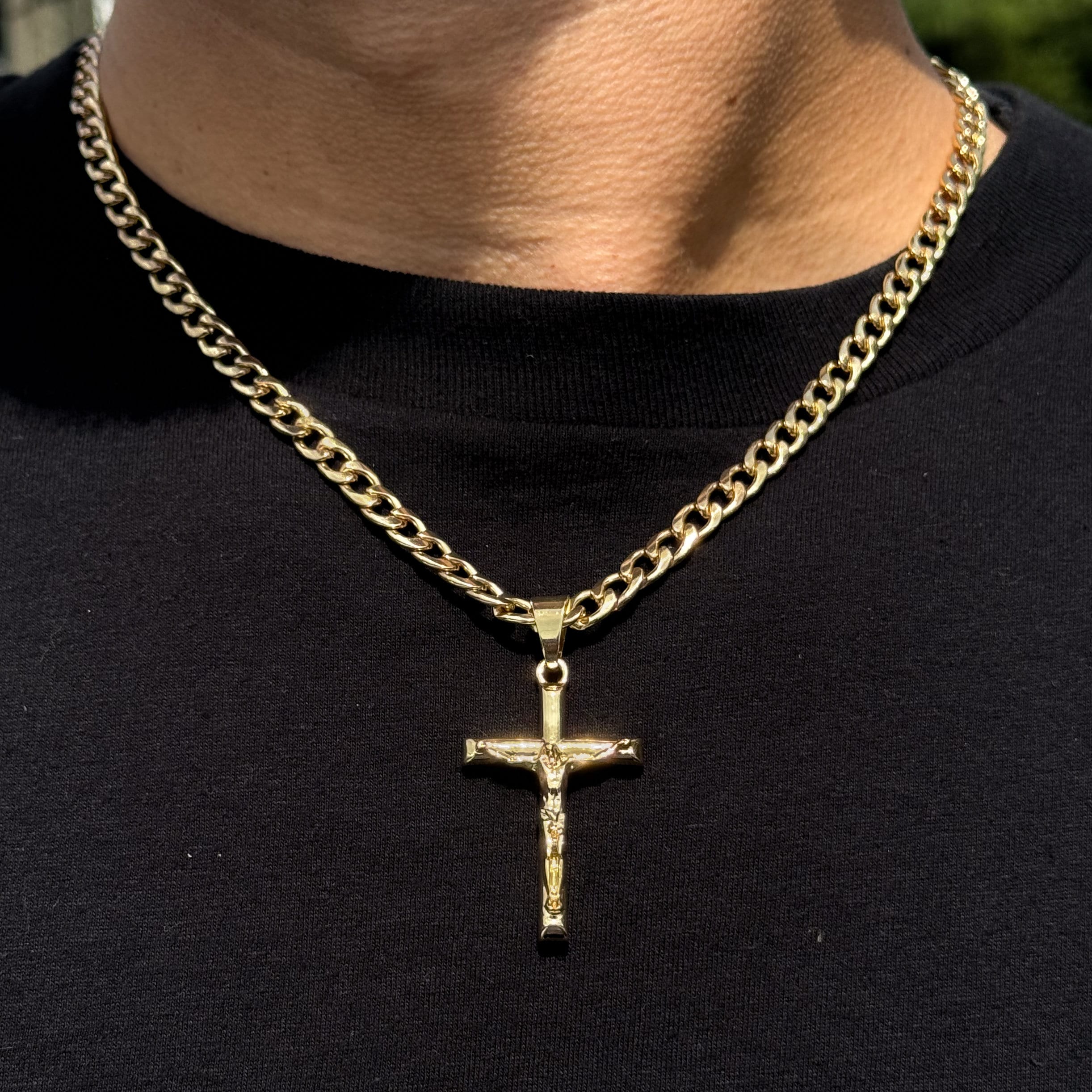 Men's medium gold crucifix pendant on 5mm Cuban chain featuring detailed Jesus design.