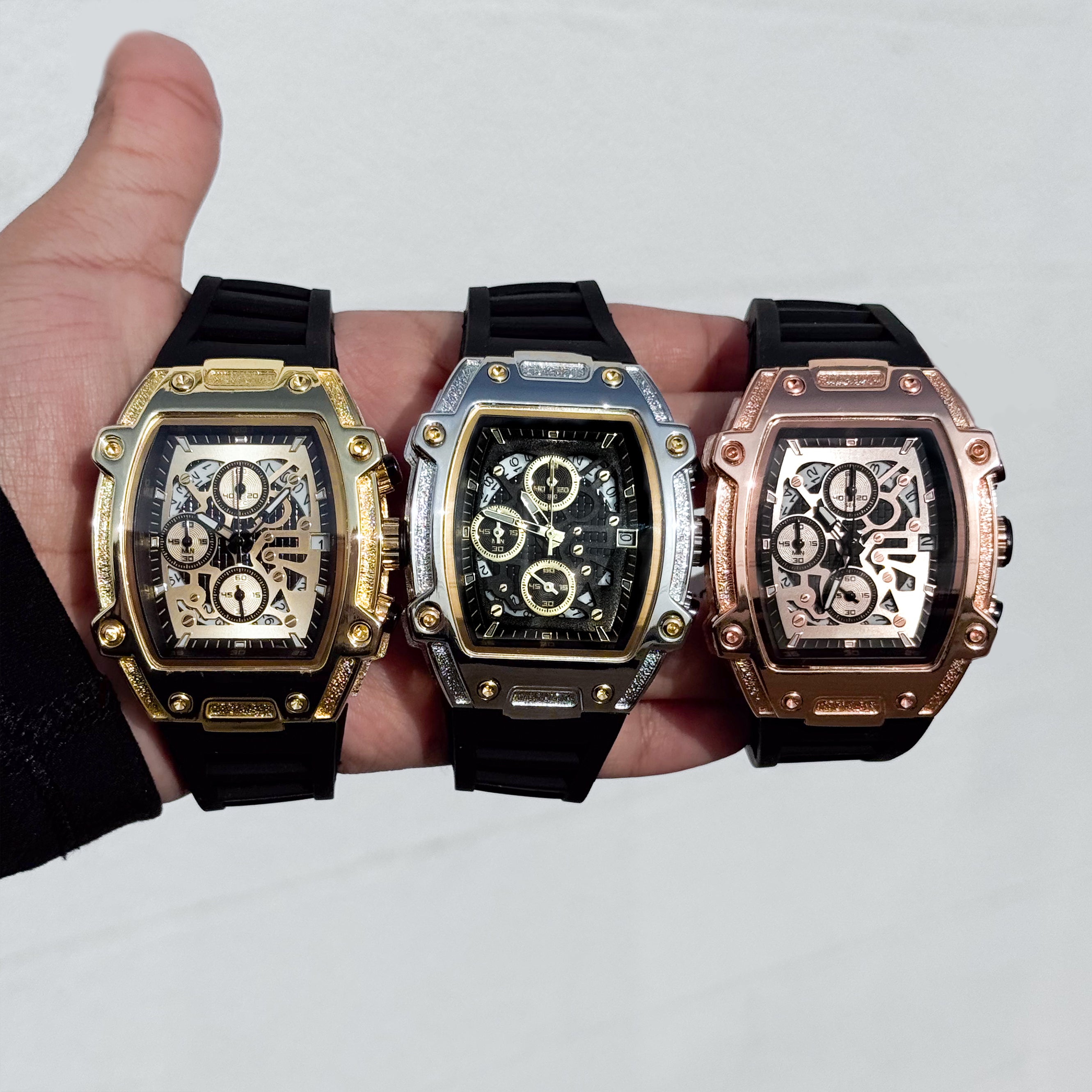 Gold, silver, and rose gold Men's 41mm silicone band watches with tonneau cases and quartz movement.