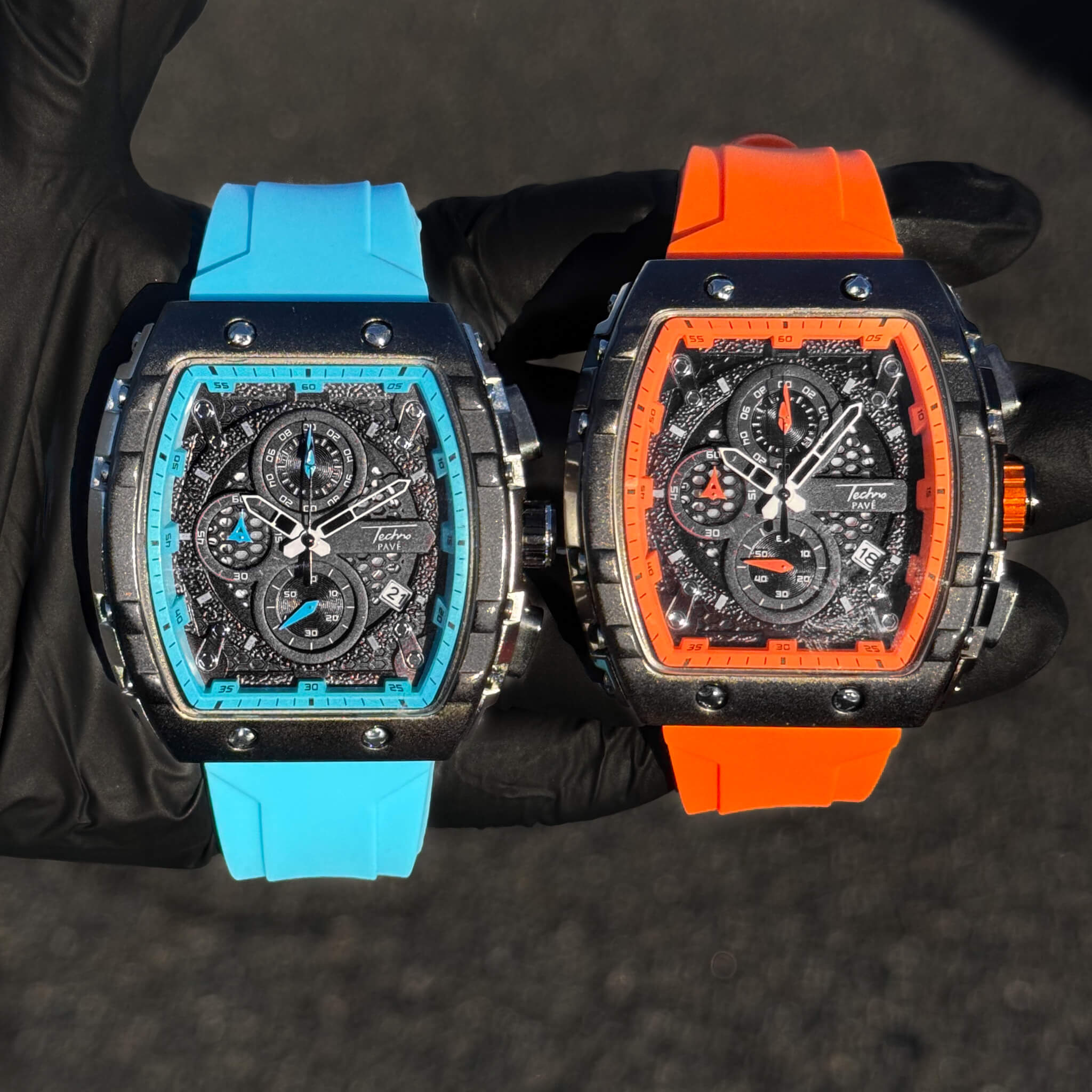 Men's 46mm sporty tonneau watches with blue and orange silicone bands and multi-dial face.