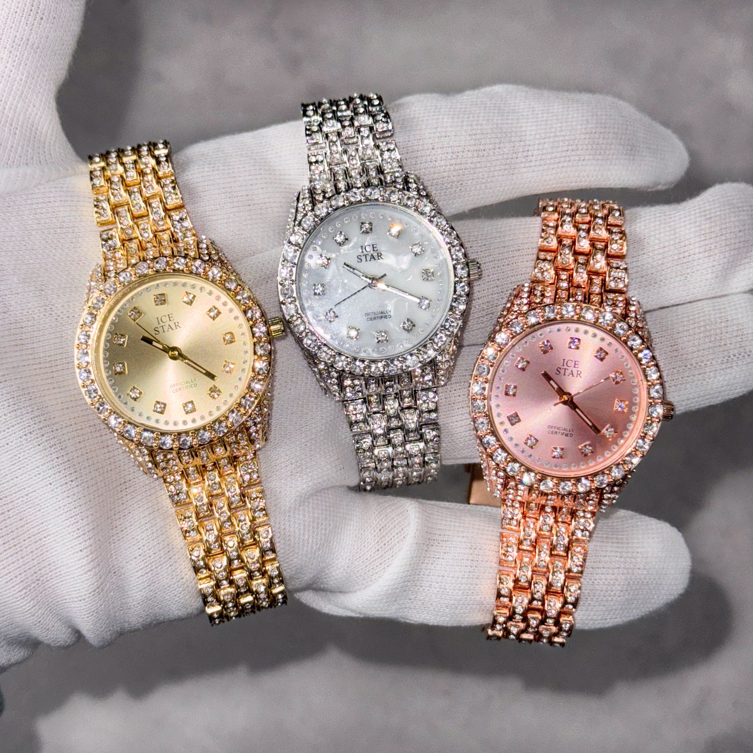 Women's 32mm diamond watches in gold, silver and rose gold with blinged bezel and crystal band.
