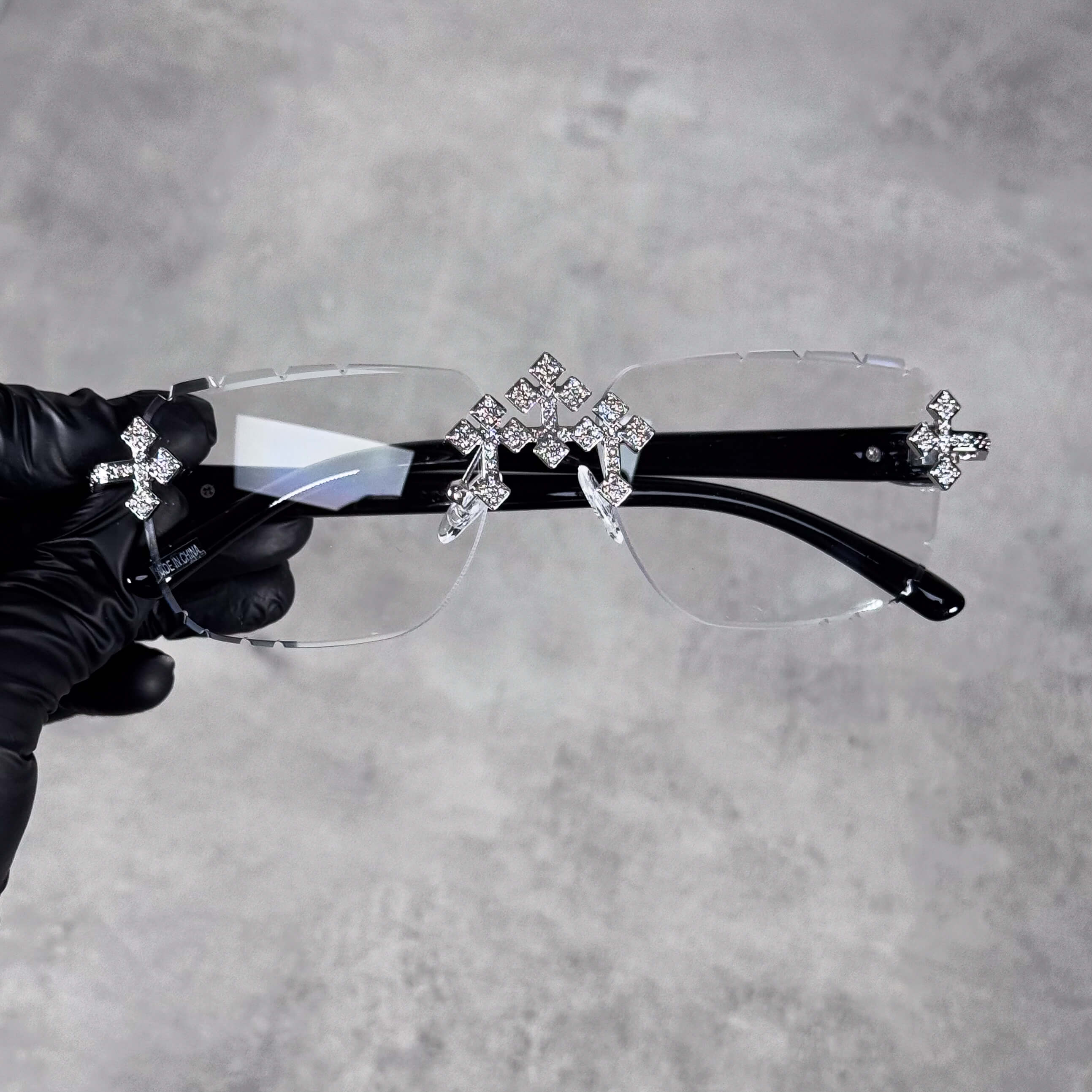 Clear lens Iced Triple Cross Sunglasses with black arms and diamond cross accents.