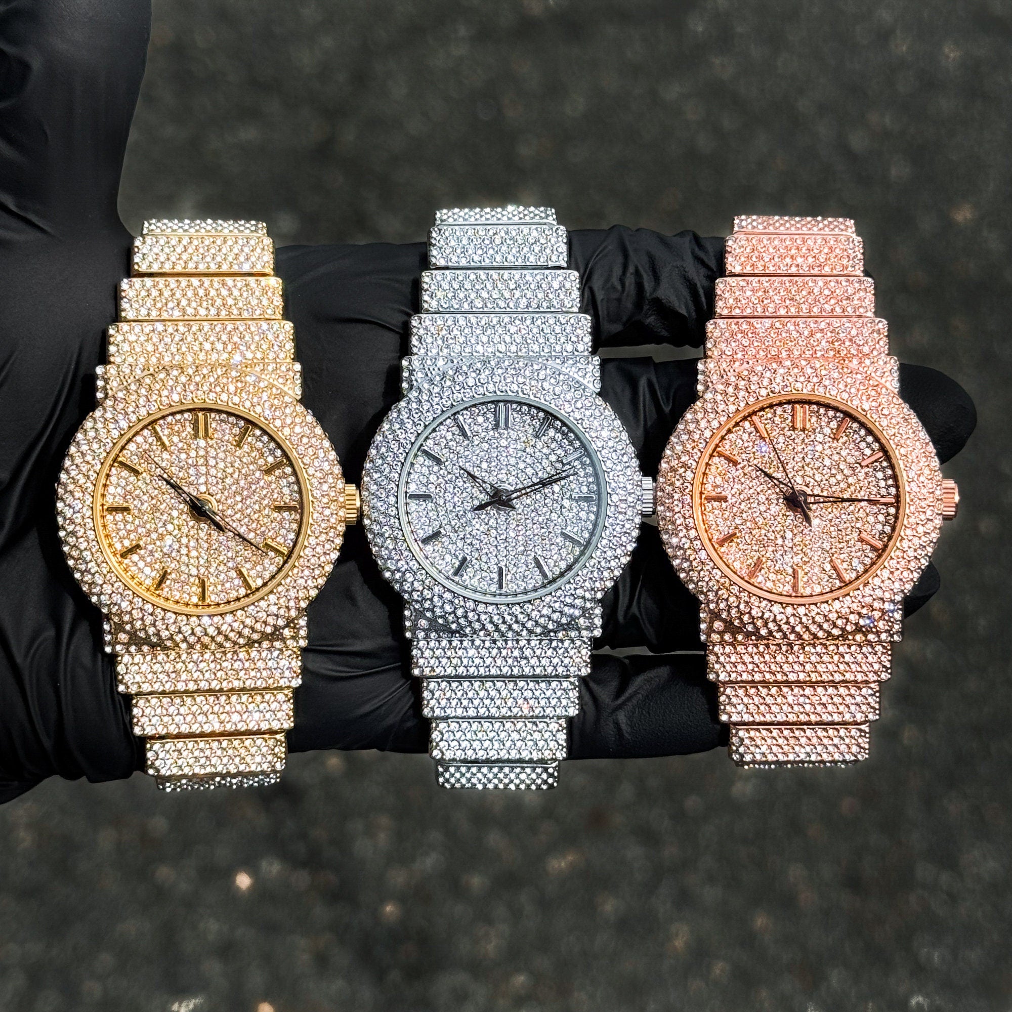 Women's 40mm luxury diamond watches in gold, silver and rose gold with fully iced-out bands.